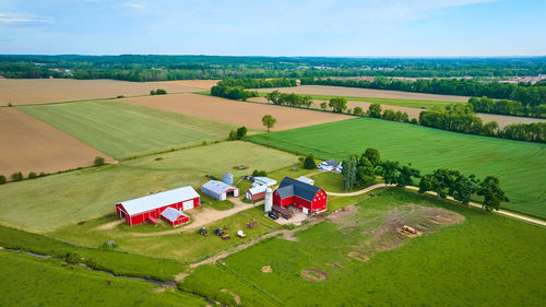 High angle view of people on field against sky