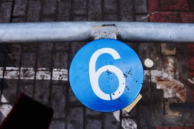 High angle view of sign on wall