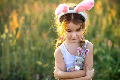 Portrait of cute girl with teddy bear