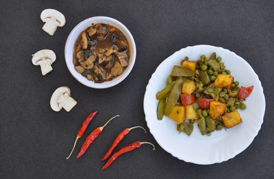 High angle view of chopped vegetables in bowl on table