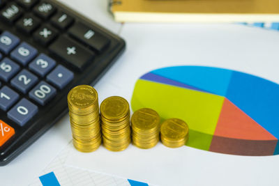 High angle view of coins on table