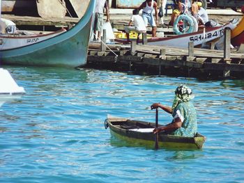 Fishing boats moored in lake