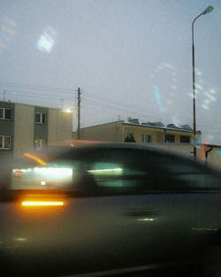 Cars on street at night