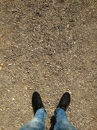 Low section of man standing on floor