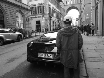 Rear view of man standing on street