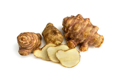 High angle view of bread against white background