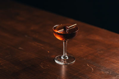 Close-up of wineglass on table