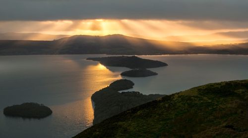 Scenic view of sea against dramatic sky