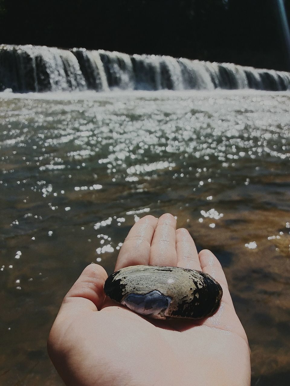 water, low section, personal perspective, person, part of, unrecognizable person, shoe, close-up, lifestyles, rock - object, leisure activity, human foot, outdoors, barefoot, nature, day