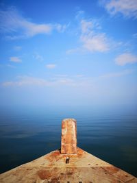 Scenic view of sea against blue sky