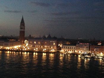 Illuminated city at waterfront