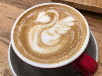 Close-up of cappuccino on table