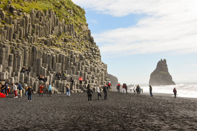 People walking on beach