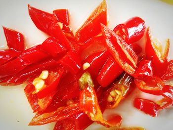 High angle view of red chili peppers in plate