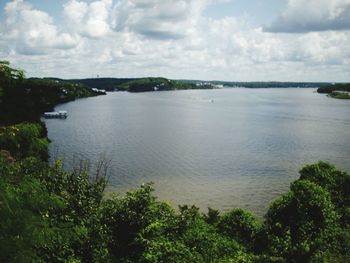 Scenic view of sea against cloudy sky