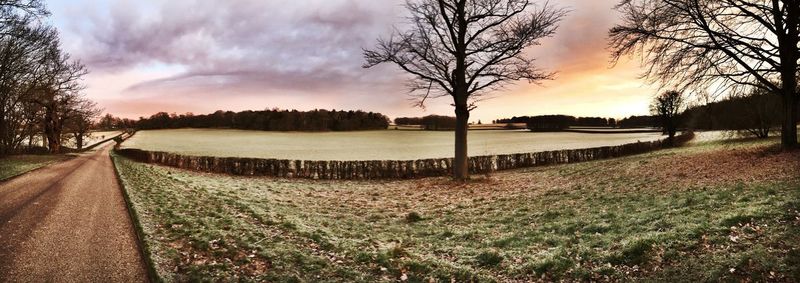 Panoramic shot of lake at sunset