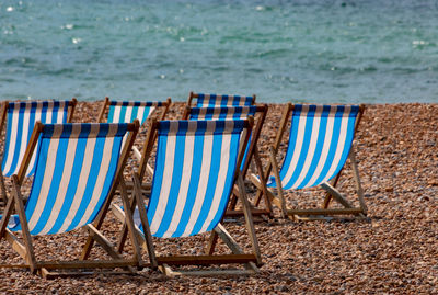 Deck chairs on beach