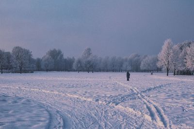 Scenic view of snow covered field