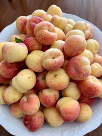 High angle view of fruits in plate on table