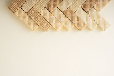 High angle view of bread on white background