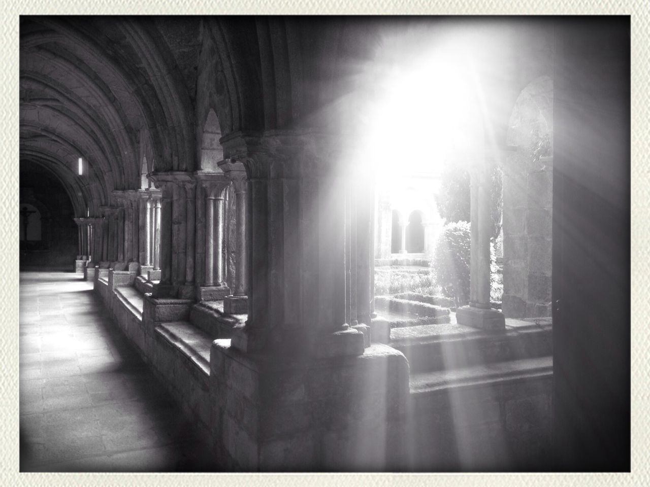 indoors, architecture, built structure, transfer print, auto post production filter, architectural column, sunlight, arch, famous place, building, incidental people, church, illuminated, men, sunbeam, corridor, reflection, interior, modern