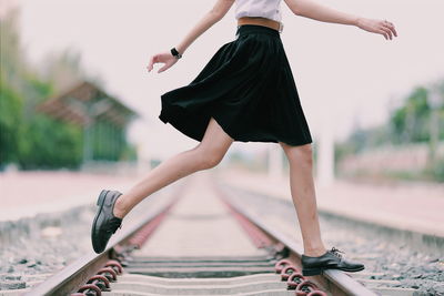 Cropped image of woman looking away