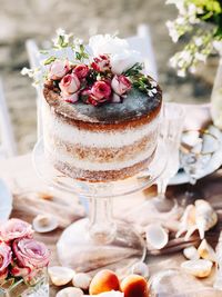 Close-up of wedding cake served on table