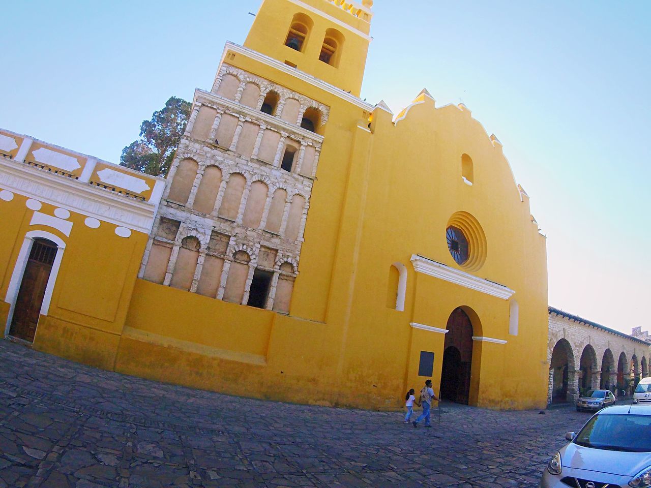 building exterior, architecture, built structure, building, sky, the past, history, religion, incidental people, arch, place of worship, spirituality, belief, nature, city, day, low angle view, travel, sunlight, outdoors