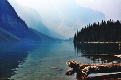 Scenic view of lake with mountains in background