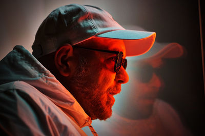 Close-up portrait of young man wearing sunglasses