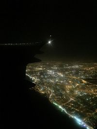 Illuminated cityscape at night