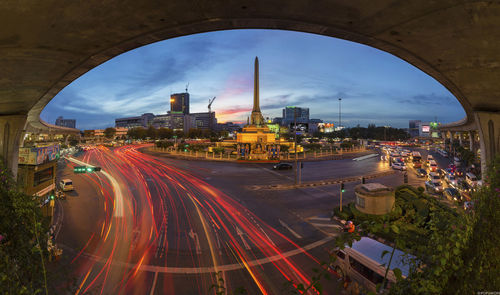 City street against cloudy sky