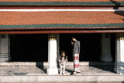 People standing outside building