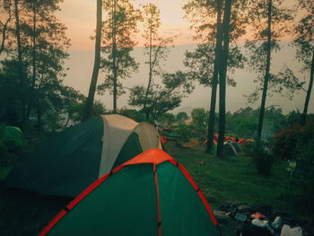 Tent on field against sky