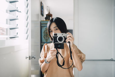 Man photographing with camera