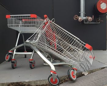 Shopping cart left empty at parking