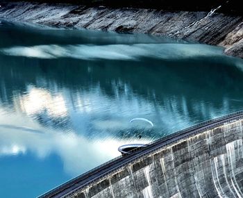 High angle view of reflection in lake during winter