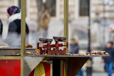 Close-up of cross in market stall