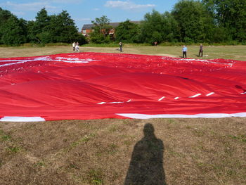 Shadow of people on field