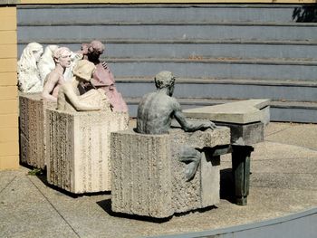 Statue on concrete wall