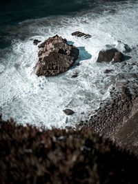High angle view of rocks on beach