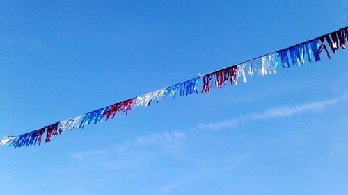 Low angle view of decoration against sky