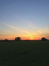 Scenic view of landscape at sunset