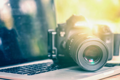 Close-up of camera on table