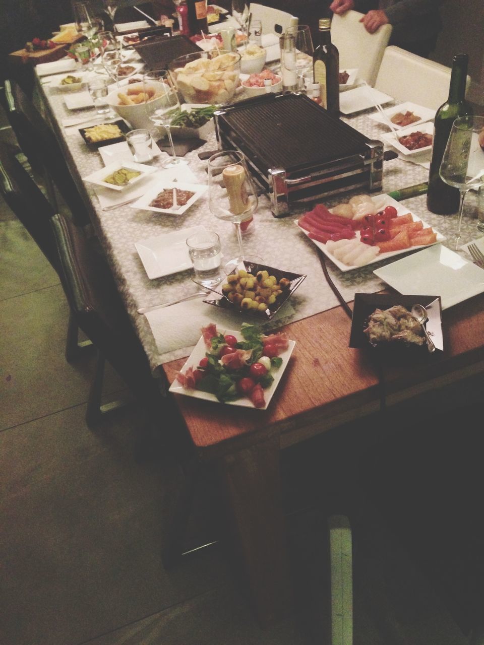 table, indoors, high angle view, variation, still life, chair, freshness, restaurant, paper, food and drink, no people, arrangement, abundance, large group of objects, absence, day, elevated view, choice, wood - material, food