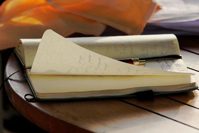 Close-up of paper on table