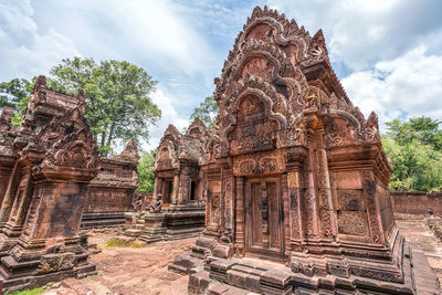 Old temple against cloudy sky