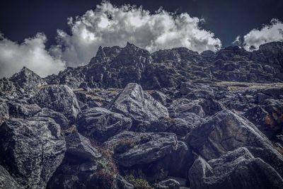 Panoramic view of rocks and mountains against sky