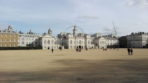 Tourists in front of historic building