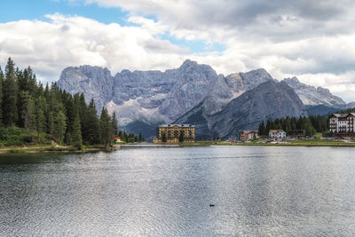 Scenic view of lake and mountains against sky